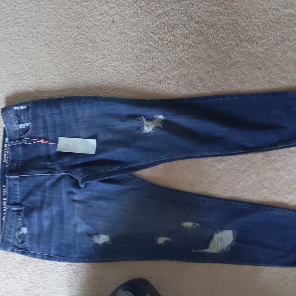 Classic Slim leg Ripped Jeans